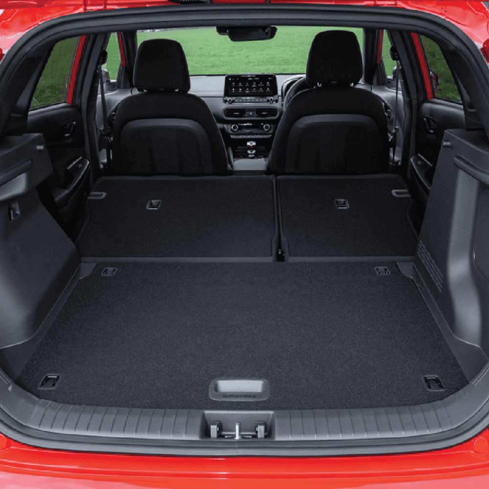 Hyundai Kona trunk cargo area with luggage kit installed, spacious and organized.