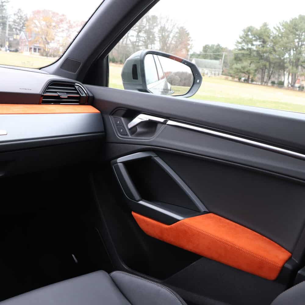 Audi Q3 interior with custom trim and luggage area accessories for enhanced comfort and style.