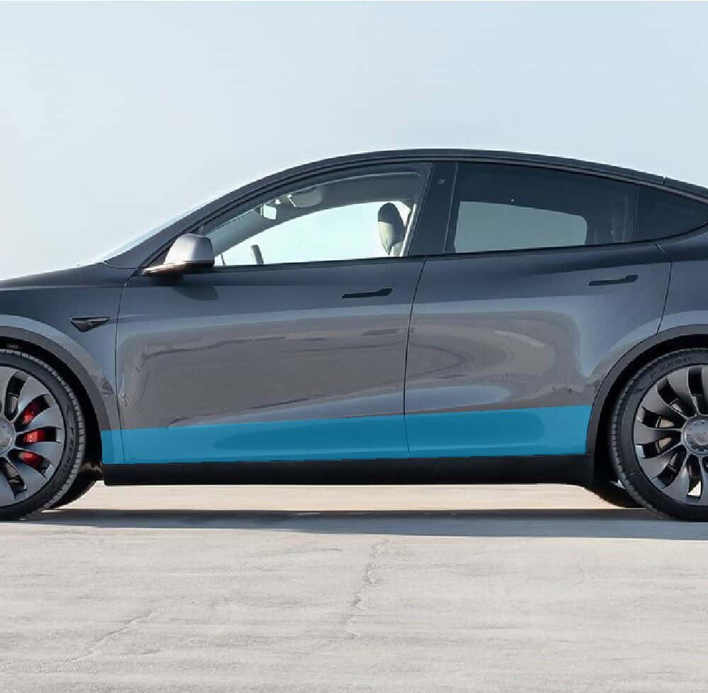 Electric Tesla Model Y with sleek black exterior and modern design.