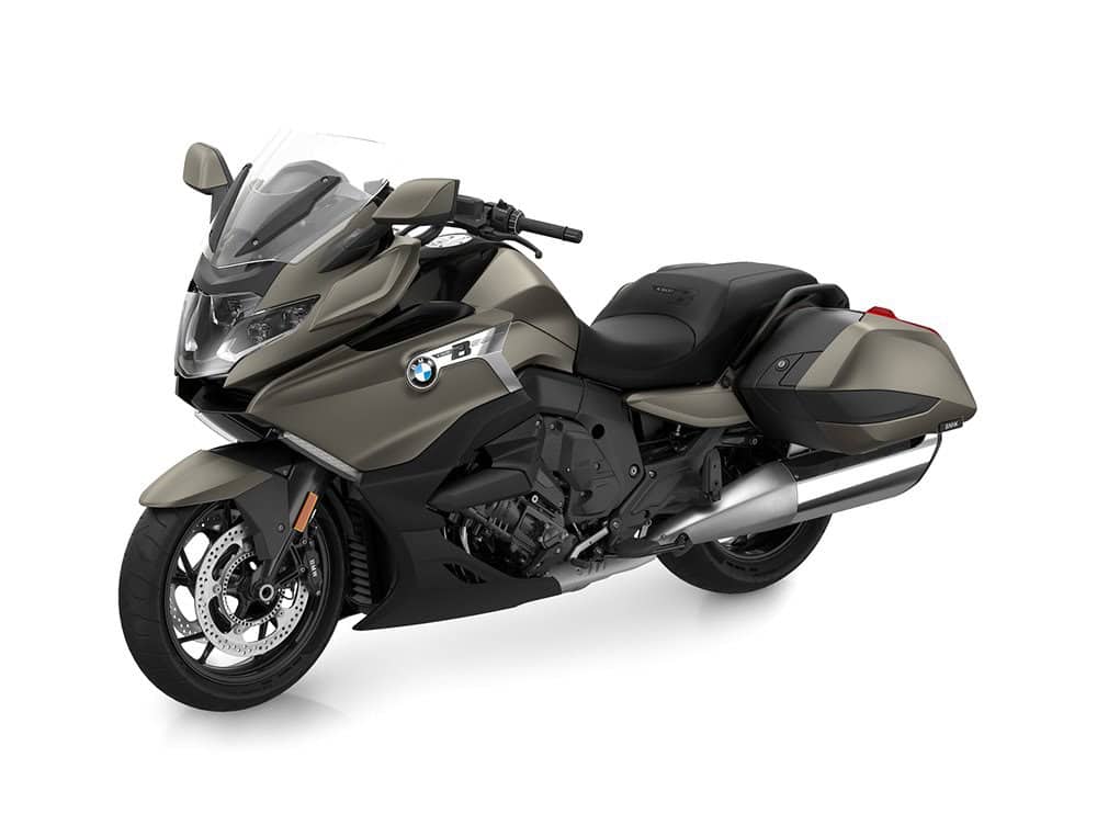 BMW touring motorcycle with saddlebags, windshield, and modern design.