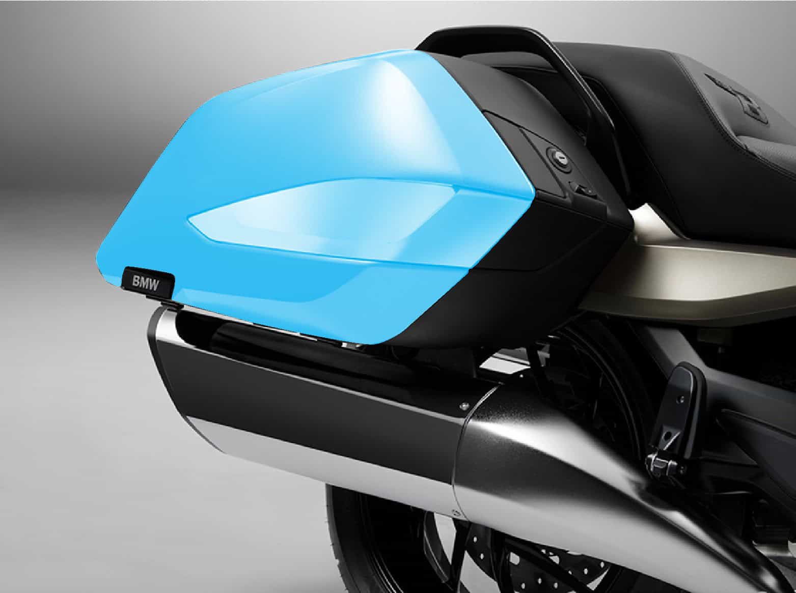 BMW motorcycle side case with blue protective cover for enhanced visibility.