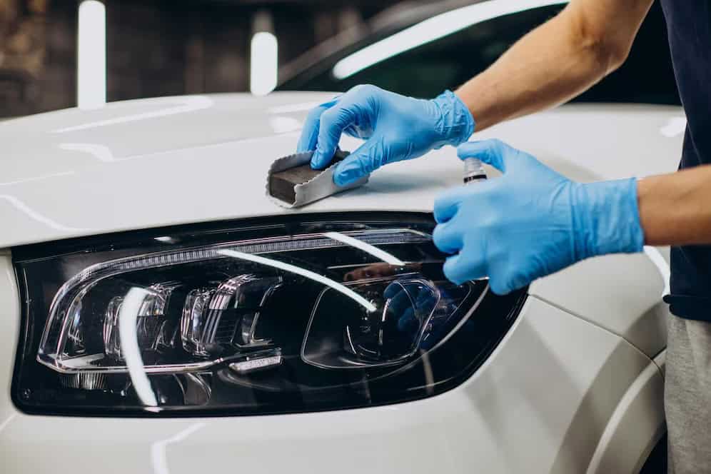 High-quality PPF application on car headlight for protection and shine.