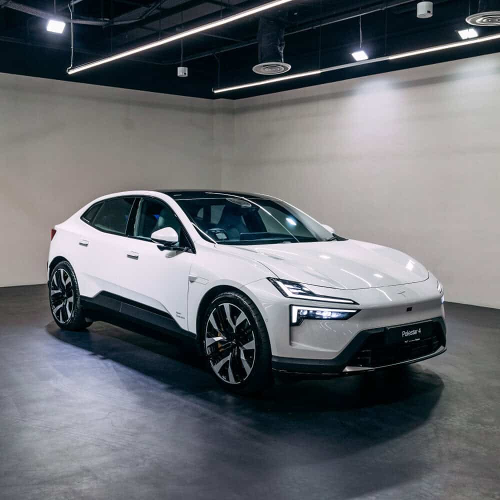 Polestar 4 electric SUV with XPEL full front end paint protection in a showroom.