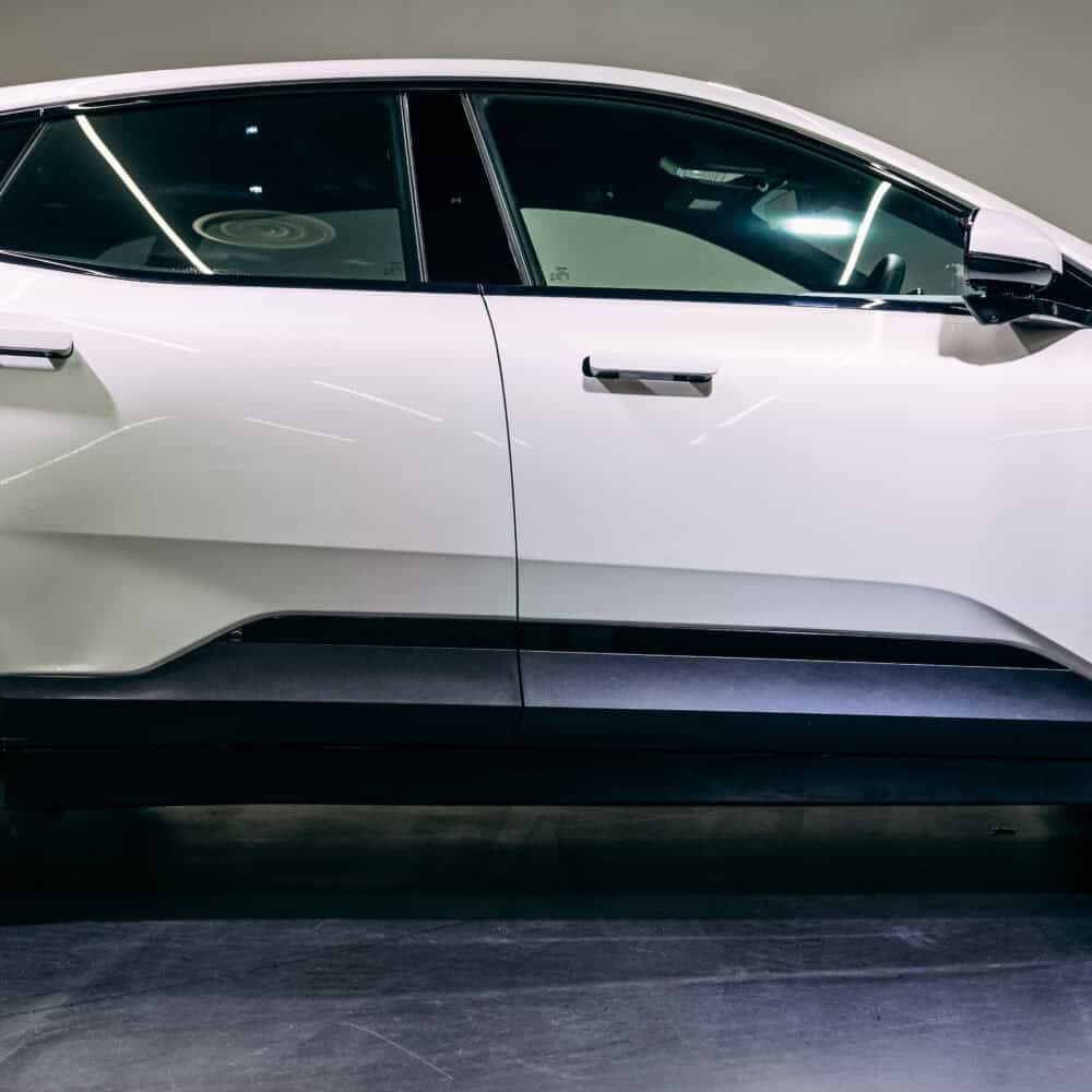 Polestar 4 vehicle fitted with XPEL door and full fender protection kit.
