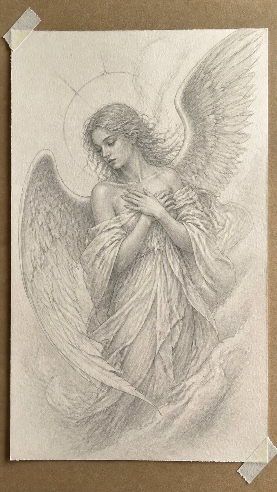20 Girl Drawing Concepts to Elevate Your Art Game 25 Hand-drawn ethereal angel in graphite drawing on textured paper, shown in a slightly off-center overhead composition, like an artist — study 3