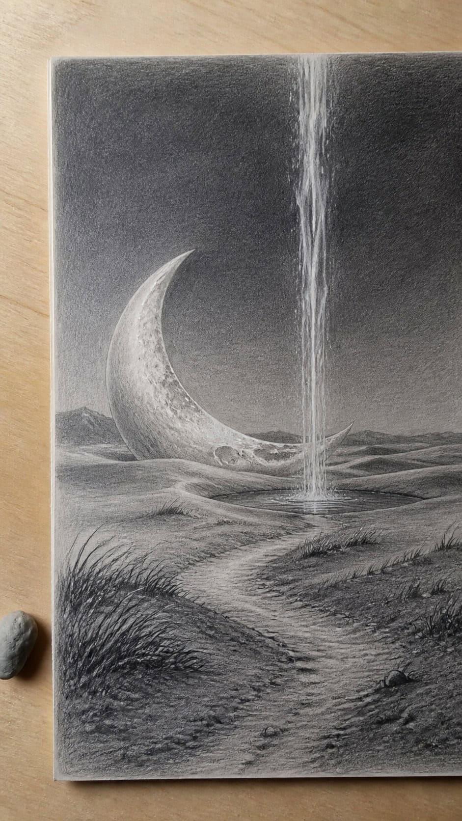 Bored with Your Sketchbook? 20 Drawing Ideas to Revive Your Creativity 8 Hand-drawn surreal dreamscapes in graphite drawing on textured paper, shown in a close overhead crop — study 3