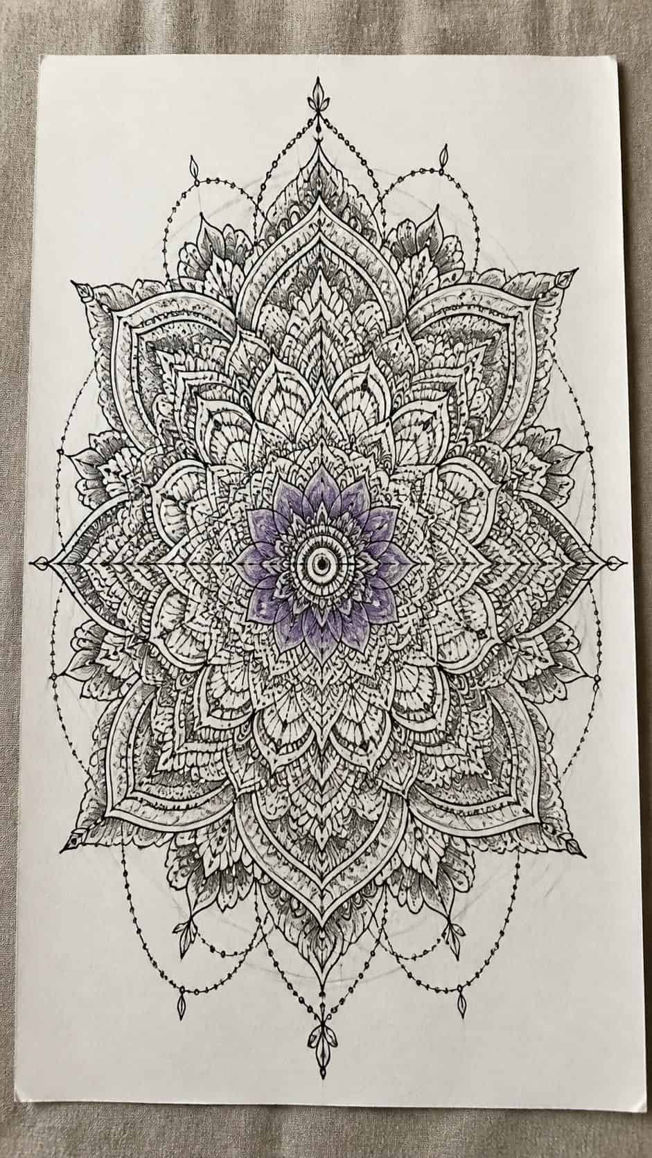 20 Challenging Drawing Ideas to Push Your Artistic Limits 2 Hand-drawn intricate mandala design in mixed-media hand drawing on textured paper, shown in a straight overhead view — study 1