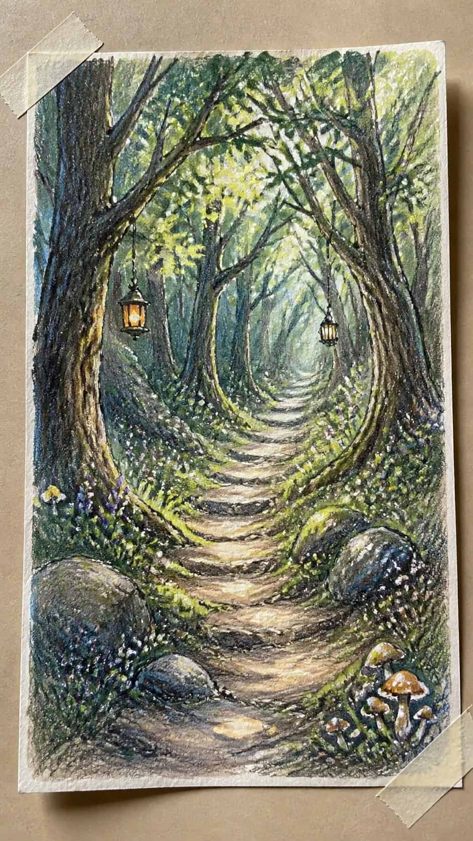 15 Landscape Drawing Ideas Worth Trying 6 Hand-drawn enchanted forest path in colored-pencil and gouache drawing on textured paper, shown in a close overhead crop — study 1
