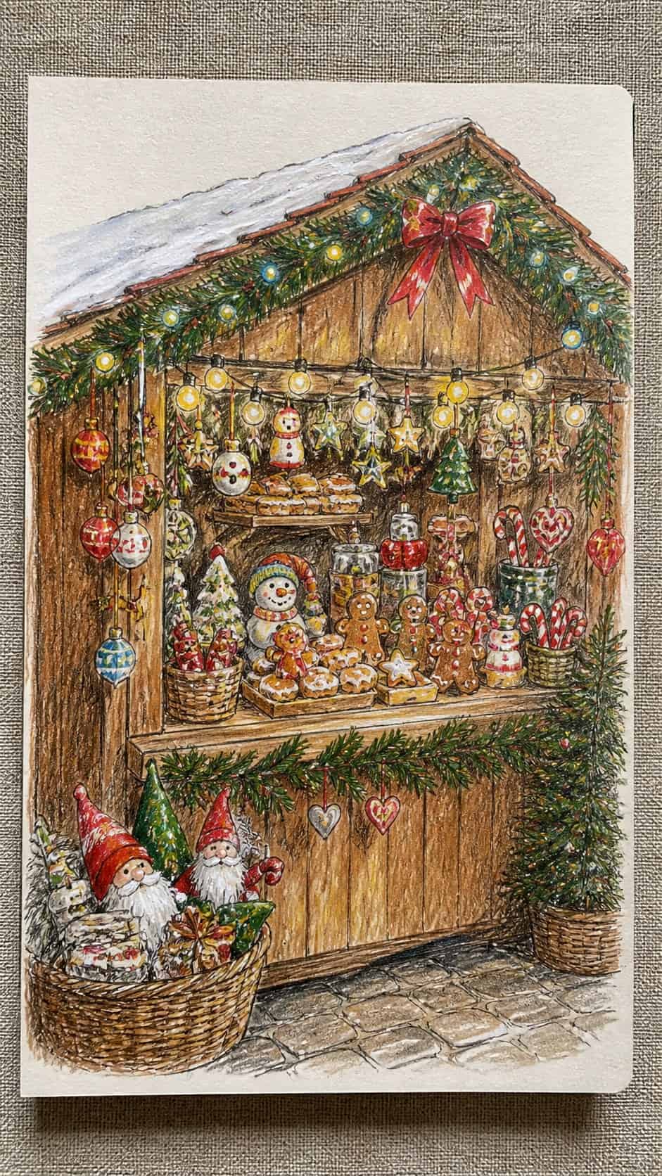 15 Christmas Drawing Ideas to Try This Holiday Season 23 Hand-drawn whimsical christmas market stall in colored-pencil and gouache drawing on textured paper, shown in a close overhead crop — study 1