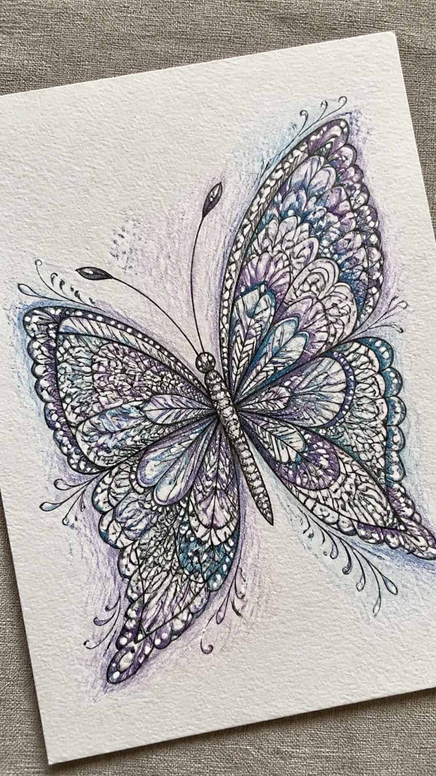 Bored of the Usual? Discover 16 Fresh Butterfly Drawing Concepts 29 Hand-drawn zentangle butterfly in colored-pencil and gouache drawing on textured paper, shown in a gentle oblique desk view that shows — study 1