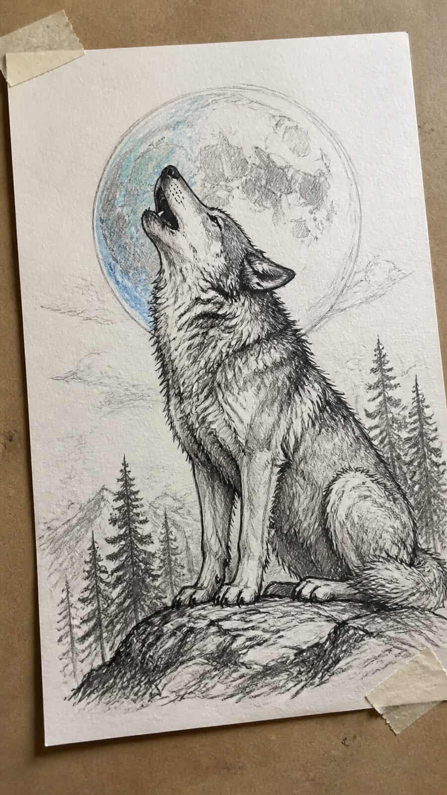 The 19 Animal Drawing Ideas Every Aspiring Artist Should Try 41 Hand-drawn majestic wolf howling in mixed-media hand drawing on textured paper, shown in a gentle oblique desk view that shows paper — study 1