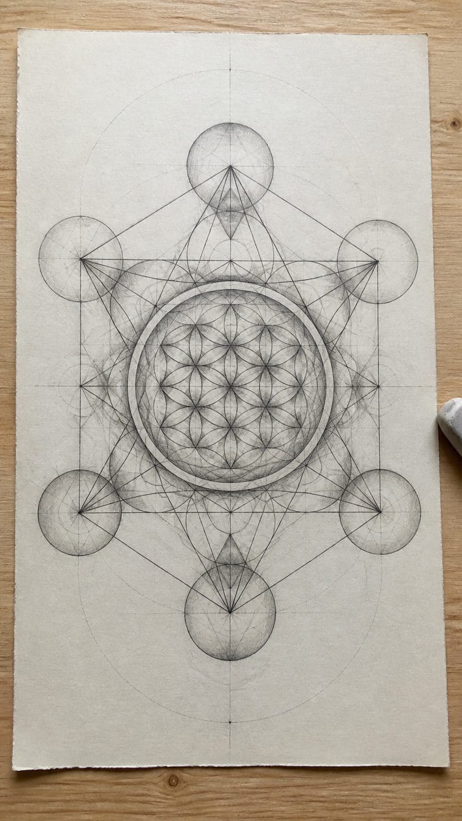 Heavenly Art: 17 God-Inspired Sketch Ideas to Awaken Your Creativity 14 Hand-drawn sacred geometry in graphite drawing on textured paper, shown in a straight overhead view — study 2