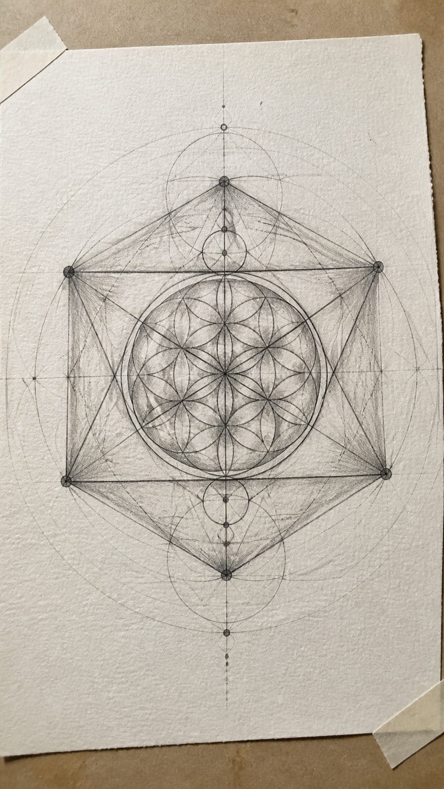 Heavenly Art: 17 God-Inspired Sketch Ideas to Awaken Your Creativity 15 Hand-drawn sacred geometry in graphite drawing on textured paper, shown in a gentle oblique desk view that shows paper tooth and — study 3