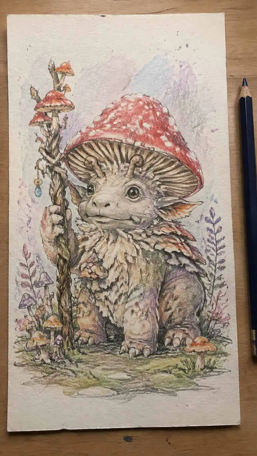 Mushroom Artistry: 17 Unique Drawing Ideas to Spark Your Imagination 20 Hand-drawn fantastical mushroom creatures in colored-pencil and gouache drawing on textured paper, shown in a straight overhead view — study 1