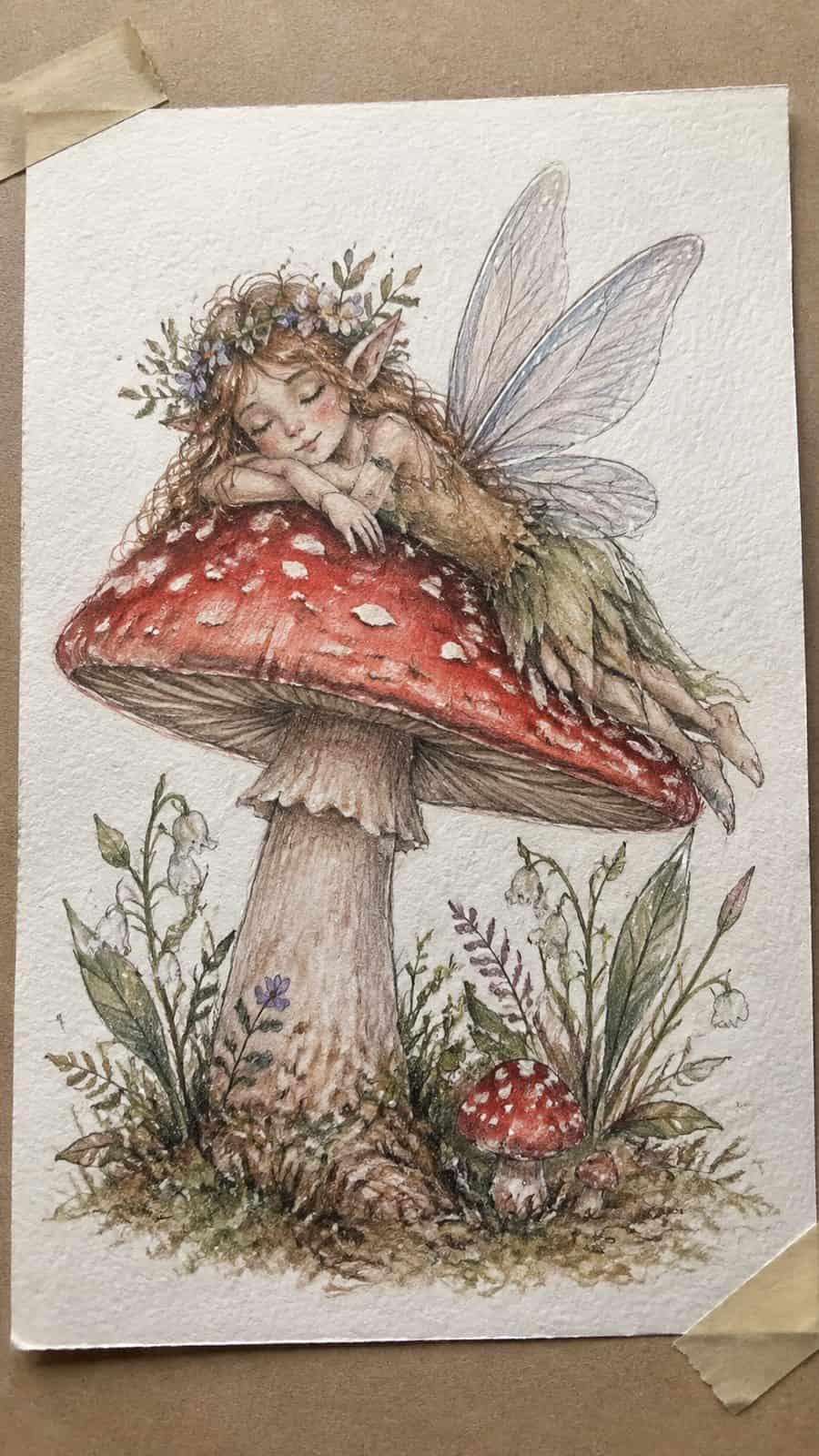 Mushroom Artistry: 17 Unique Drawing Ideas to Spark Your Imagination 29 Hand-drawn mushroom and fairy duo in colored-pencil and gouache drawing on textured paper, shown in a close overhead crop — study 3