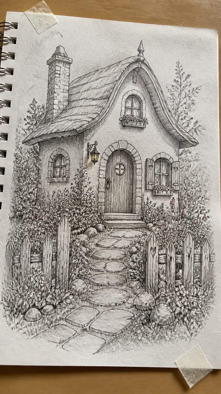 Explore 19 House Drawing Ideas That Blend Imagination with Reality 3 Hand-drawn the dream cottage in mixed-media hand drawing on textured paper, shown in a gentle oblique desk view that shows paper tooth — study 2
