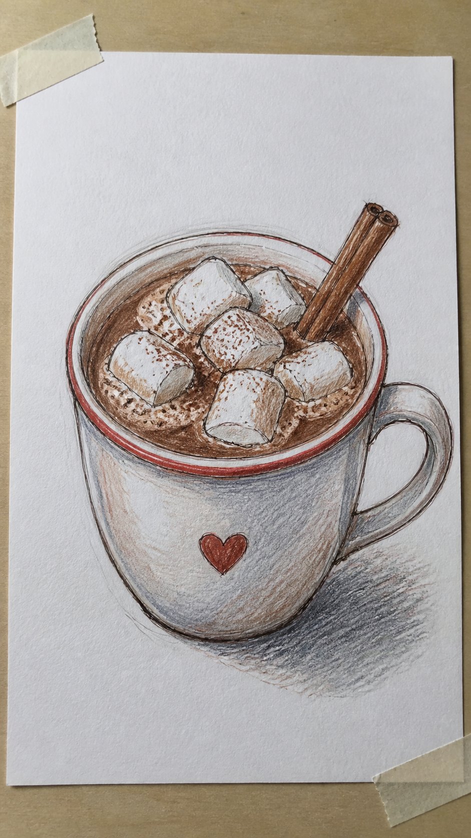 Hand-drawn hot cocoa mug in colored-pencil drawing on textured paper, shown in a close overhead crop — study 1