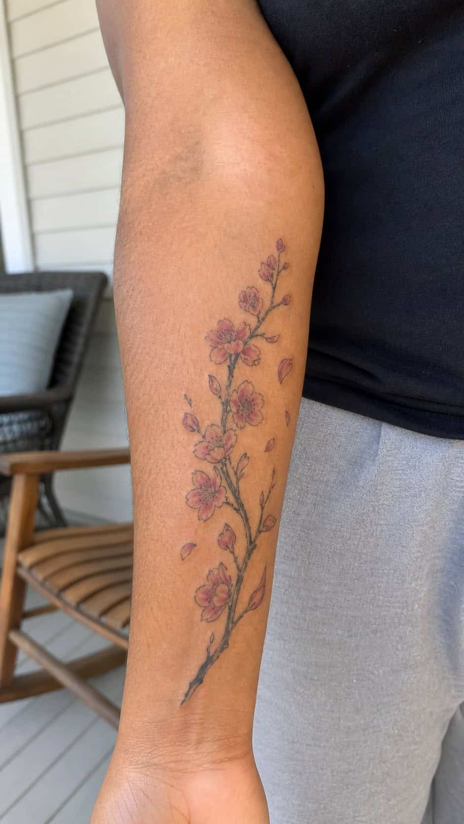 Empowering and Beautiful: 23 Japanese Tattoos for the Modern Woman 5 Healed cherry blossom serenity tattoo on a adult woman's inner forearm, photographed in a natural straight-on close view, a touch — study 2