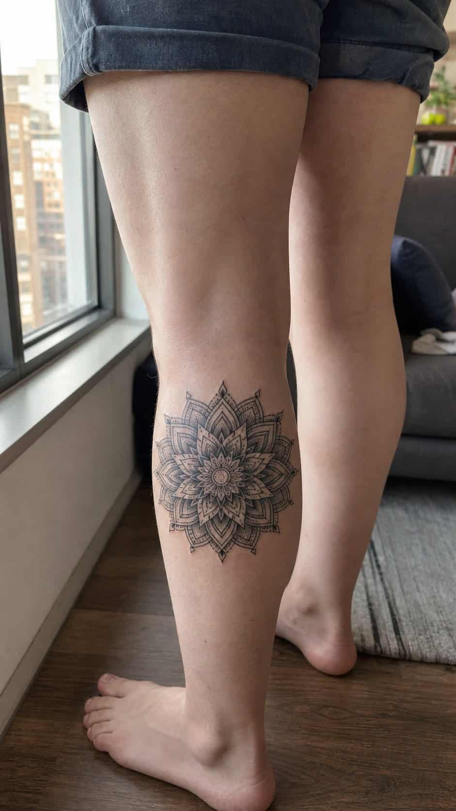 38 Creative Tattoo Ideas for Women 5 Healed geometric mandala tattoo on a adult woman's outer calf, photographed in a natural waist-height candid close-up — study 2