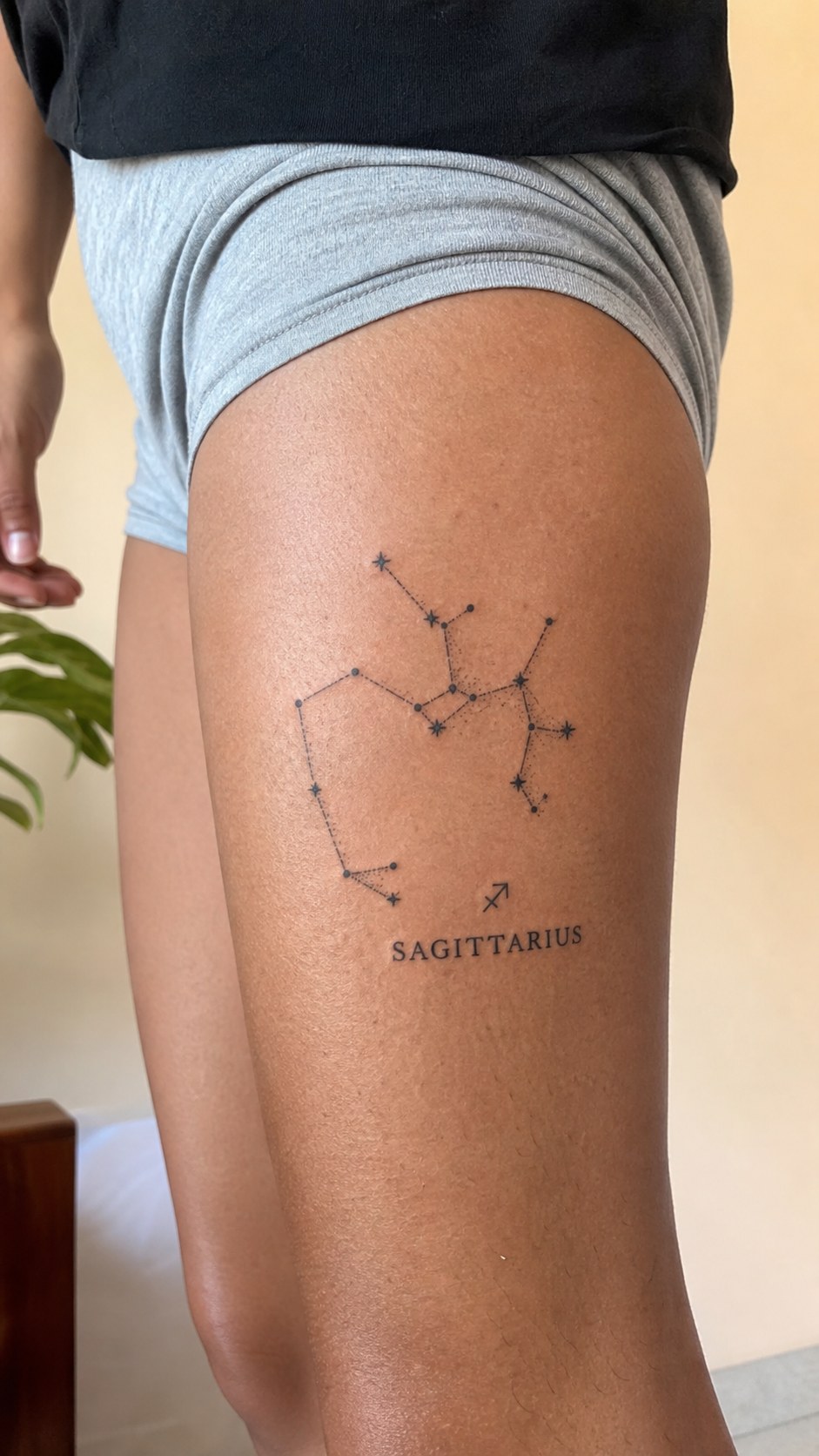 38 Creative Tattoo Ideas for Women 24 Healed zodiac constellation tattoo on a adult woman's outer thigh, photographed in a natural slightly elevated close view — study 2