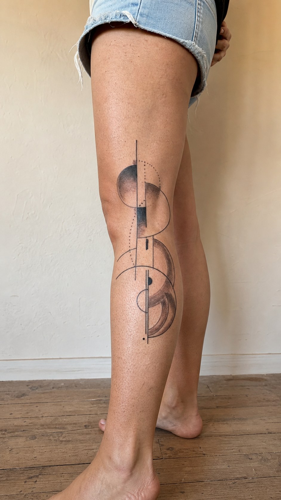 38 Creative Tattoo Ideas for Women 30 Healed abstract art tattoo on a adult woman's outer calf, photographed in a natural gentle side angle that clearly shows how the ink — study 1