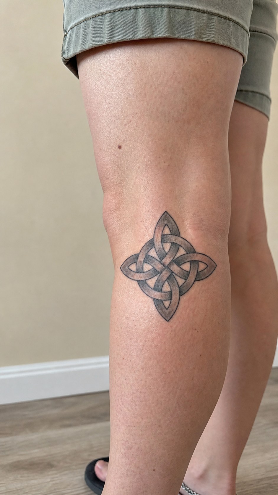 38 Creative Tattoo Ideas for Women 39 Healed celtic knot tattoo on a adult woman's outer calf, photographed in a natural straight-on close view, a touch off-center like a — study 1