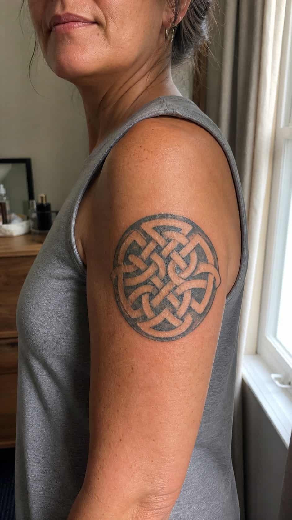 38 Creative Tattoo Ideas for Women 40 Healed celtic knot tattoo on a adult woman's outer upper arm, photographed in a natural gentle side angle that clearly shows how the — study 2