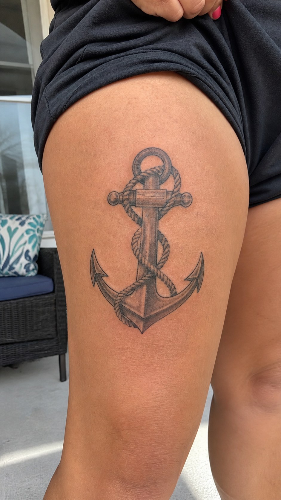 38 Creative Tattoo Ideas for Women 43 Healed anchor with rope tattoo on a adult woman's outer thigh, photographed in a natural relaxed documentary crop — study 1
