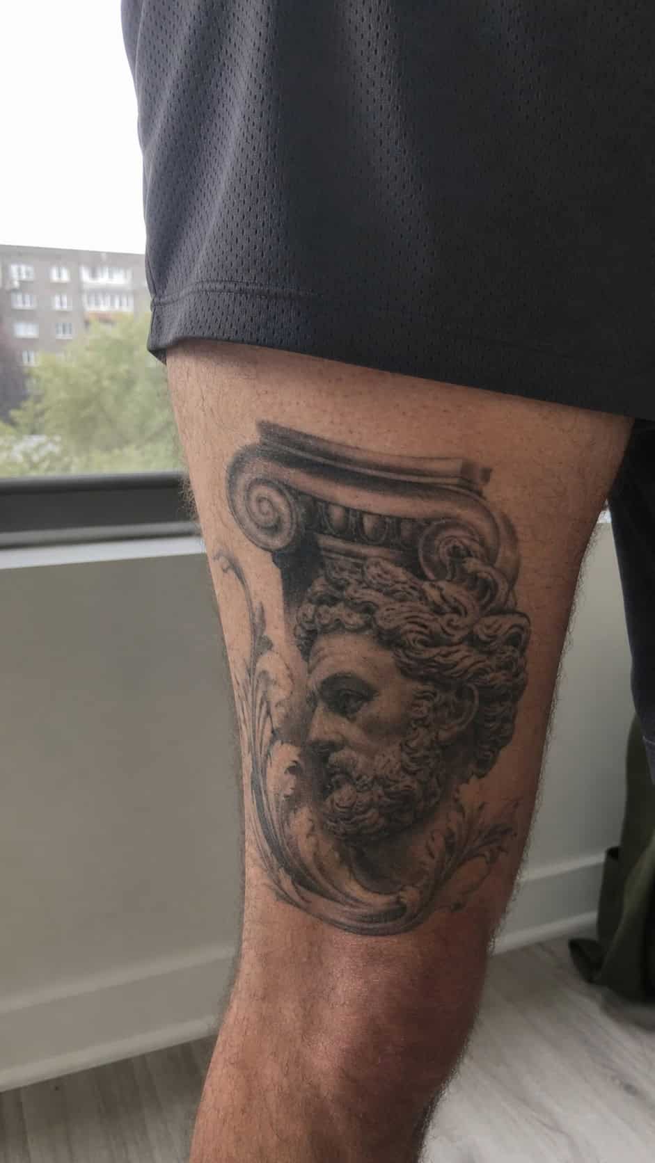 Feeling Bold? Try These 25 Killer Thigh Tattoo Ideas for Men 39 Healed renaissance masterpiece tattoo on a adult man's outer thigh, photographed in a natural straight-on close view, a touch — study 1