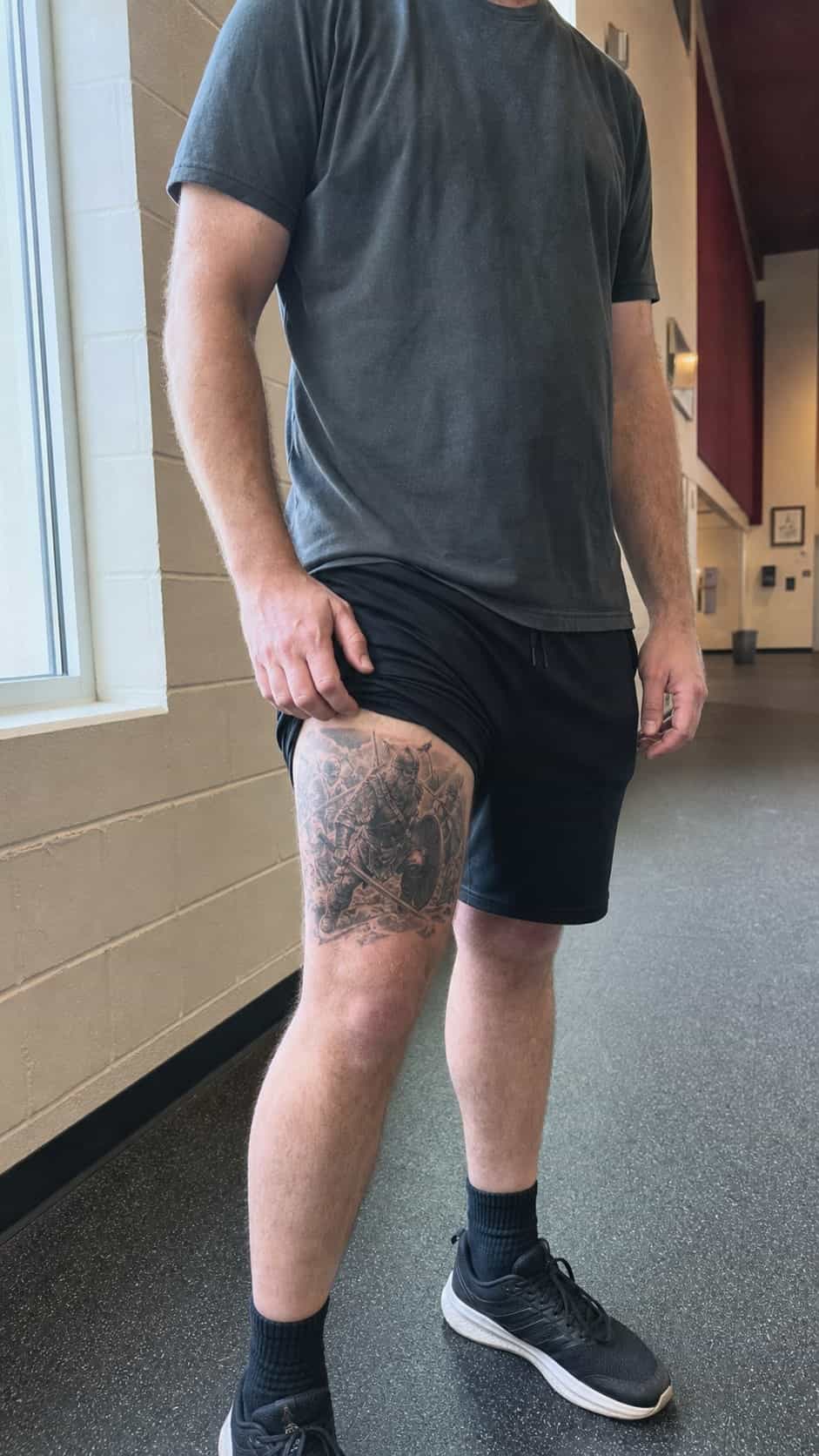 Feeling Bold? Try These 25 Killer Thigh Tattoo Ideas for Men 48 Healed viking warrior in battle tattoo on a adult man's outer thigh, photographed in a natural relaxed documentary crop — study 3