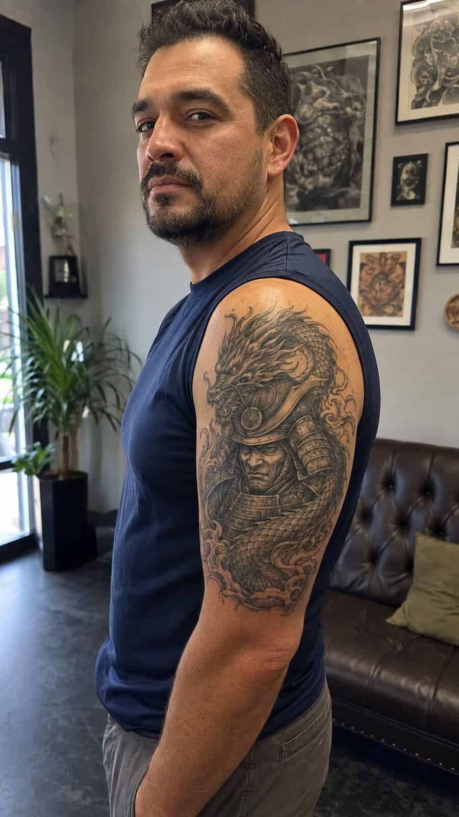 Unlock Your Next Ink: 25 Epic Upper Arm Tattoo Ideas for Men 51 Healed samurai dragon tattoo on a adult man's outer upper arm, photographed in a natural waist-height candid close-up — study 3