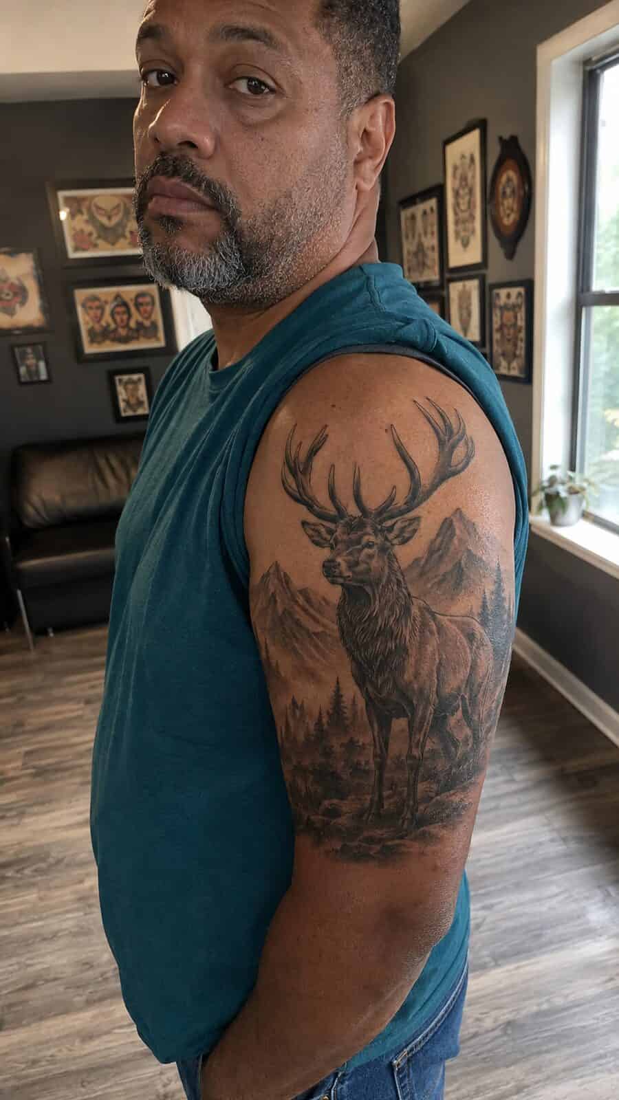 Unlock Your Next Ink: 25 Epic Upper Arm Tattoo Ideas for Men 60 Healed majestic stag tattoo on a adult man's outer upper arm, photographed in a natural relaxed documentary crop — study 2