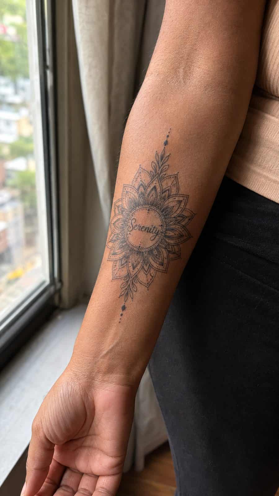 35 Forearm Tattoos for Women Worth Considering 13 Healed serenity mandala tattoo on a adult woman's inner forearm, photographed in a natural gentle side angle that clearly shows how — study 1