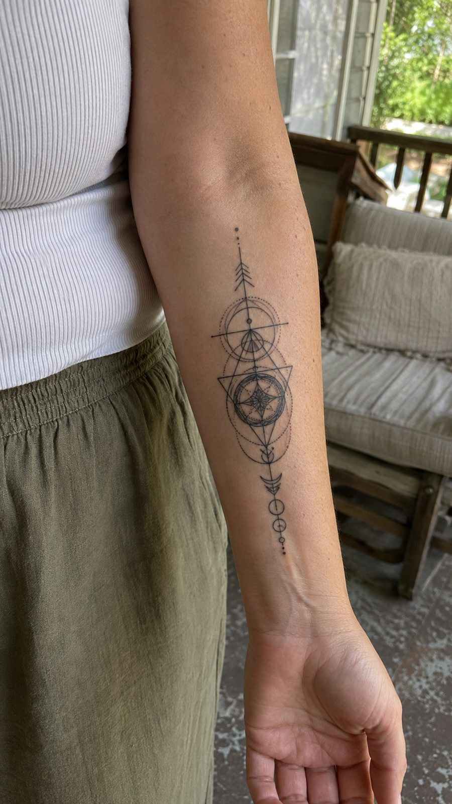 35 Forearm Tattoos for Women Worth Considering 25 Healed geometric harmony tattoo on a adult woman's inner forearm, photographed in a natural relaxed documentary crop — study 2