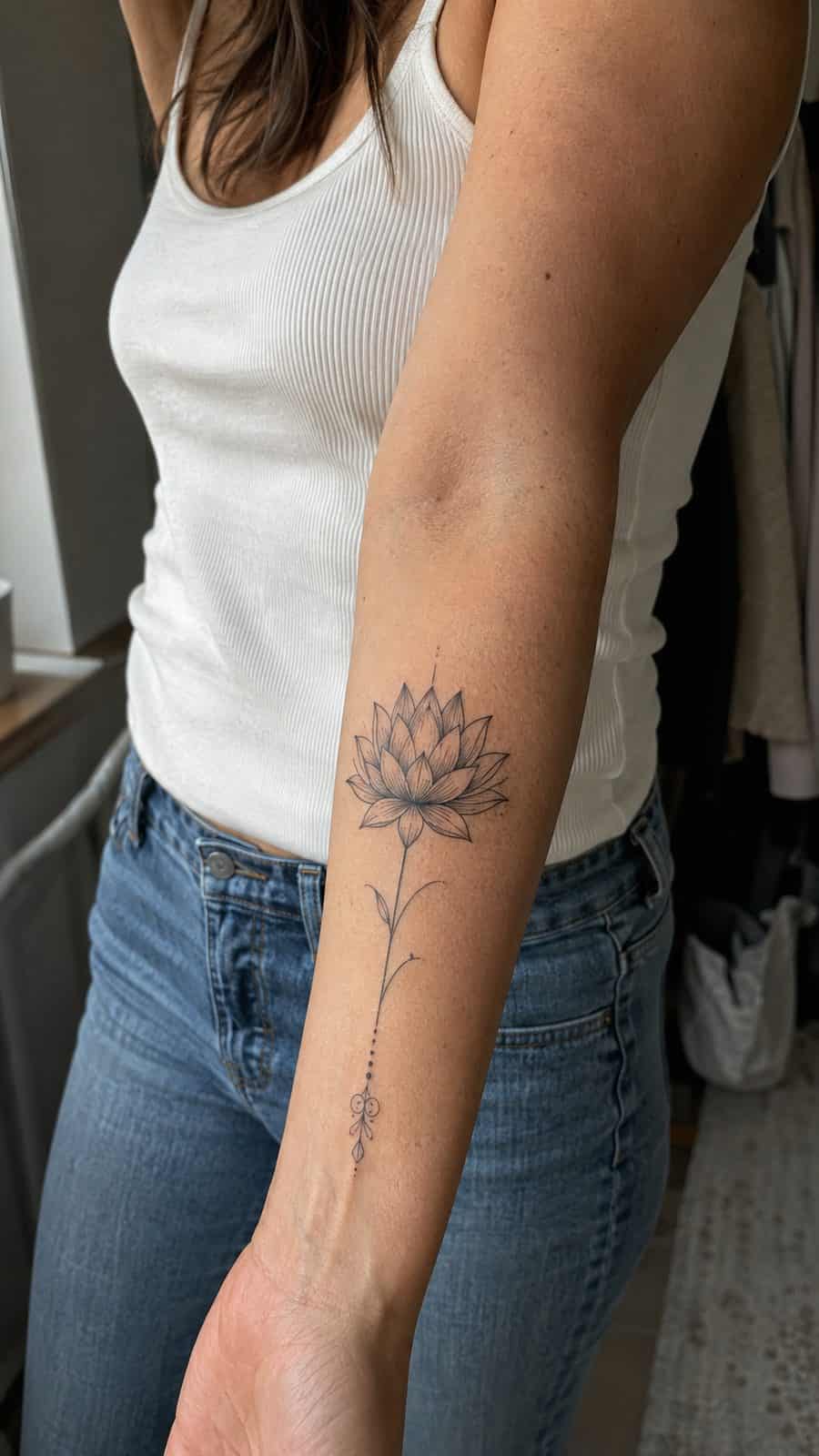 35 Forearm Tattoos for Women Worth Considering 32 Healed lotus blossom tattoo on a adult woman's inner forearm, photographed in a natural slightly elevated close view — study 2