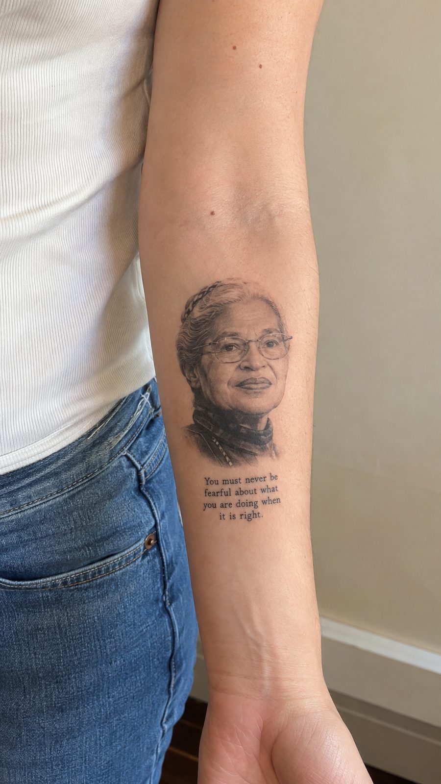 35 Forearm Tattoos for Women Worth Considering 35 Healed inspirational portrait tattoo on a adult woman's inner forearm, photographed in a natural straight-on close view, a touch — study 2