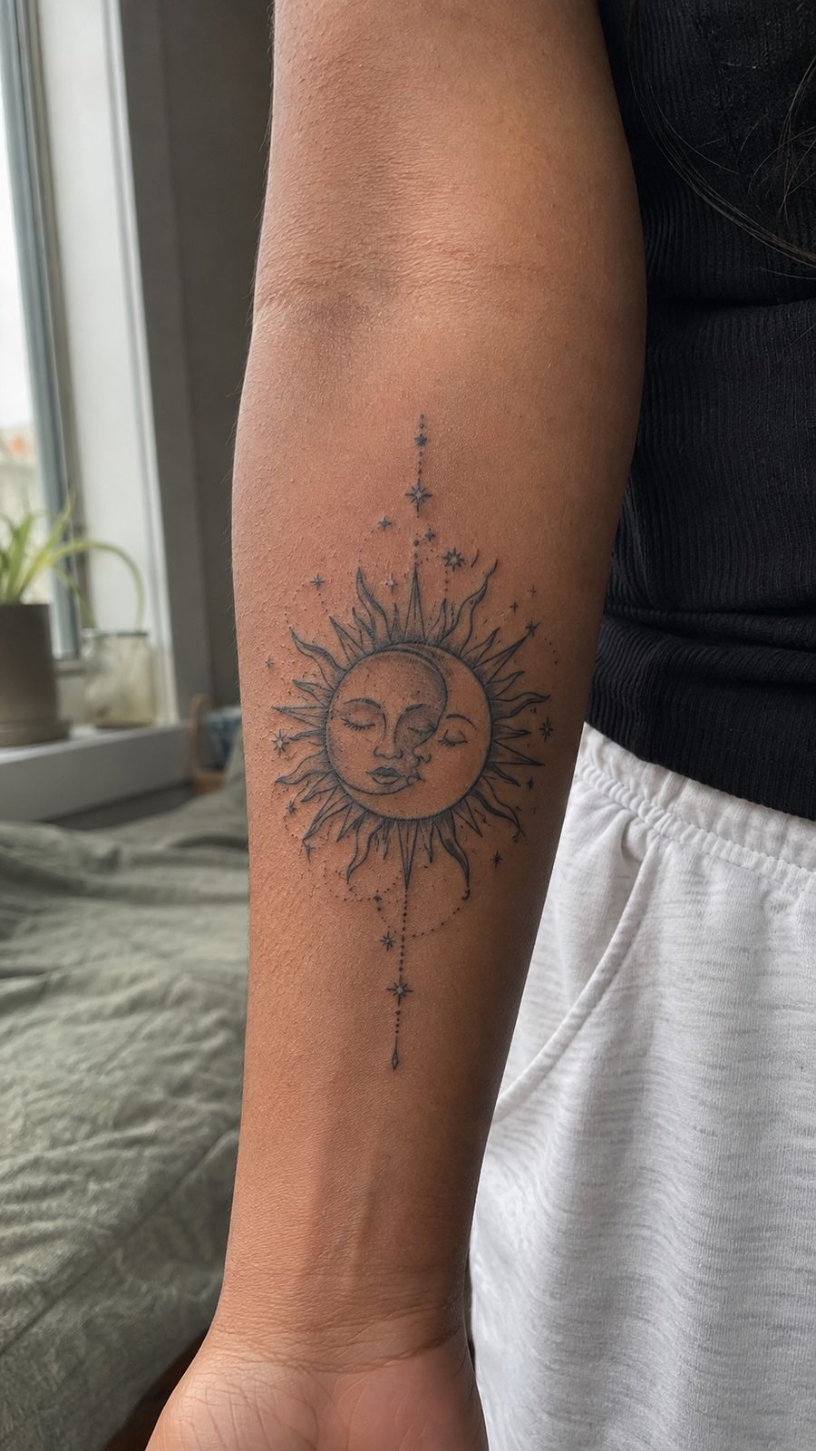 35 Forearm Tattoos for Women Worth Considering 42 Healed sun and moon balance tattoo on a adult woman's inner forearm, photographed in a natural gentle side angle that clearly shows — study 2