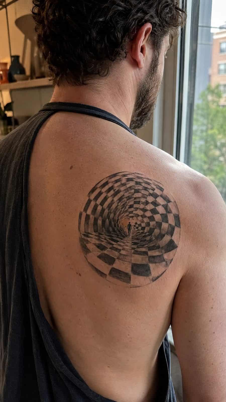 48 Tattoo Ideas for Men Worth Considering for Your Next Ink 26 Healed illusion mastery tattoo on a adult man's upper back, photographed in a natural gentle side angle that clearly shows how the ink — study 2