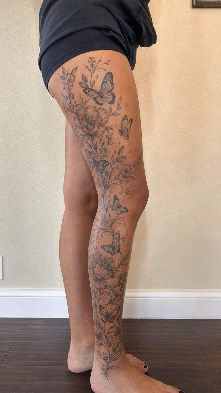 32 Gorgeous Female Leg Sleeve Tattoos 10 Healed ethereal butterfly garden tattoo on a adult woman's full outer leg sleeve, photographed in a natural gentle side angle that — study 2