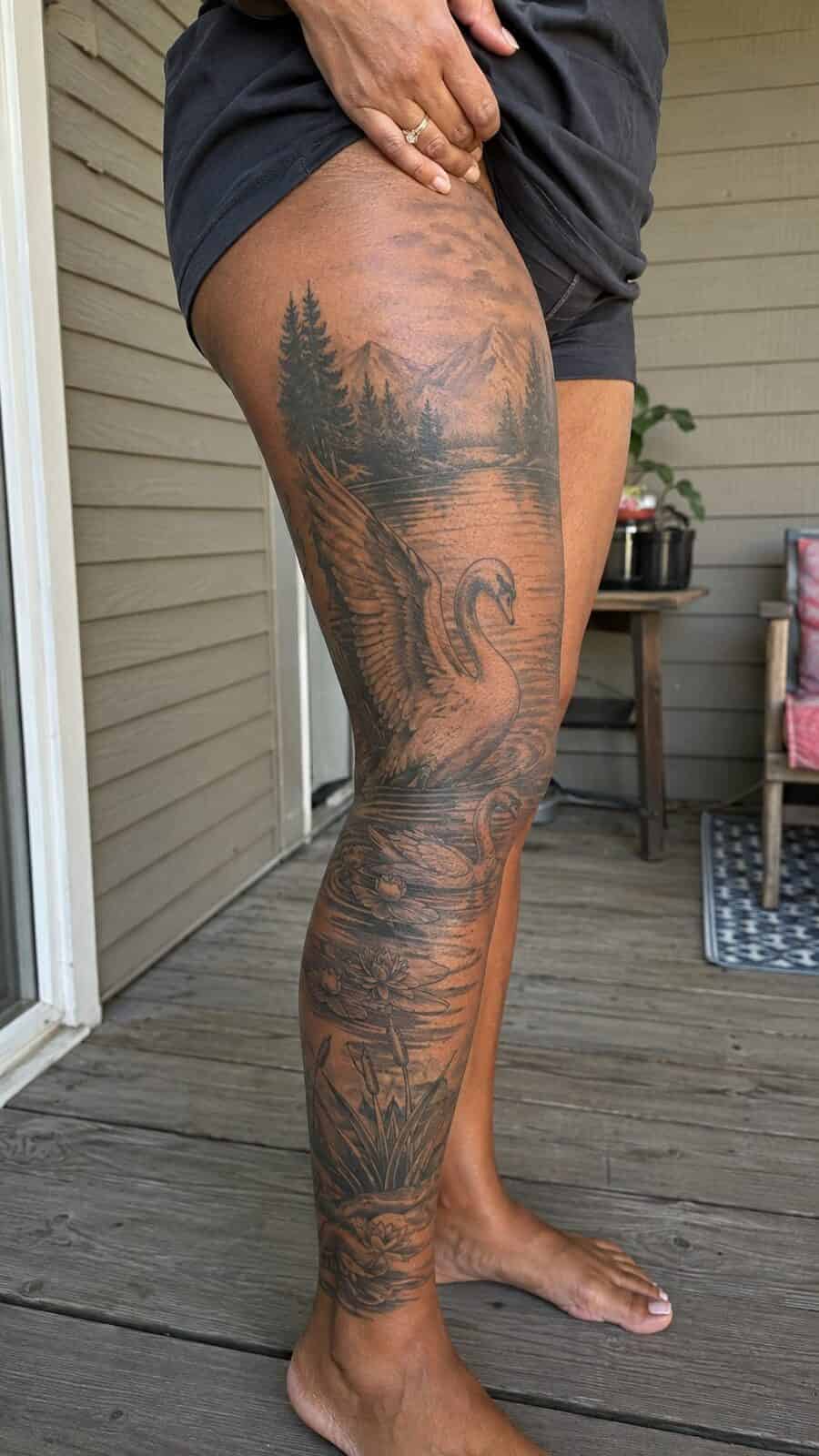 32 Gorgeous Female Leg Sleeve Tattoos 32 Healed graceful swan lake tattoo on a adult woman's full outer leg sleeve, photographed in a natural waist-height candid close-up — study 2