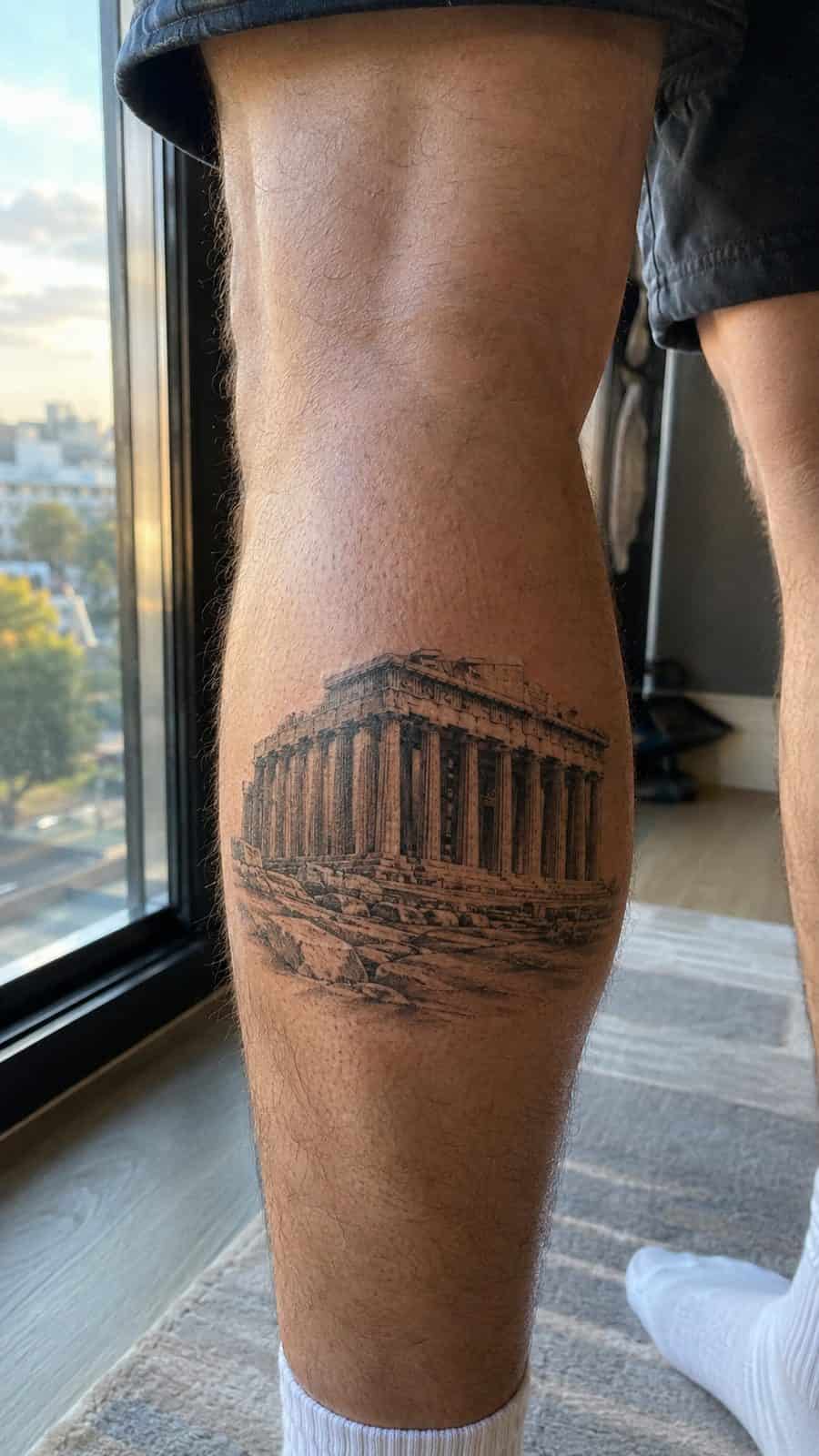 Modern Spartan: 18 Greek Tattoo Ideas Every Man Should Consider 26 Healed the parthenon tattoo on a adult man's outer calf, photographed in a natural straight-on close view, a touch off-center like a — study 3