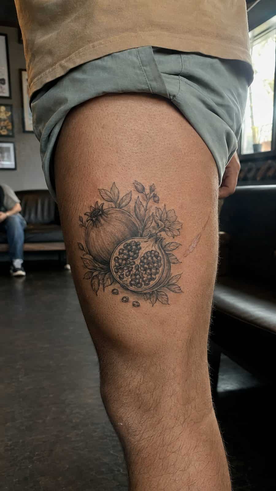 Modern Spartan: 18 Greek Tattoo Ideas Every Man Should Consider 28 Healed persephone's pomegranate tattoo on a adult man's outer thigh, photographed in a natural relaxed documentary crop — study 2