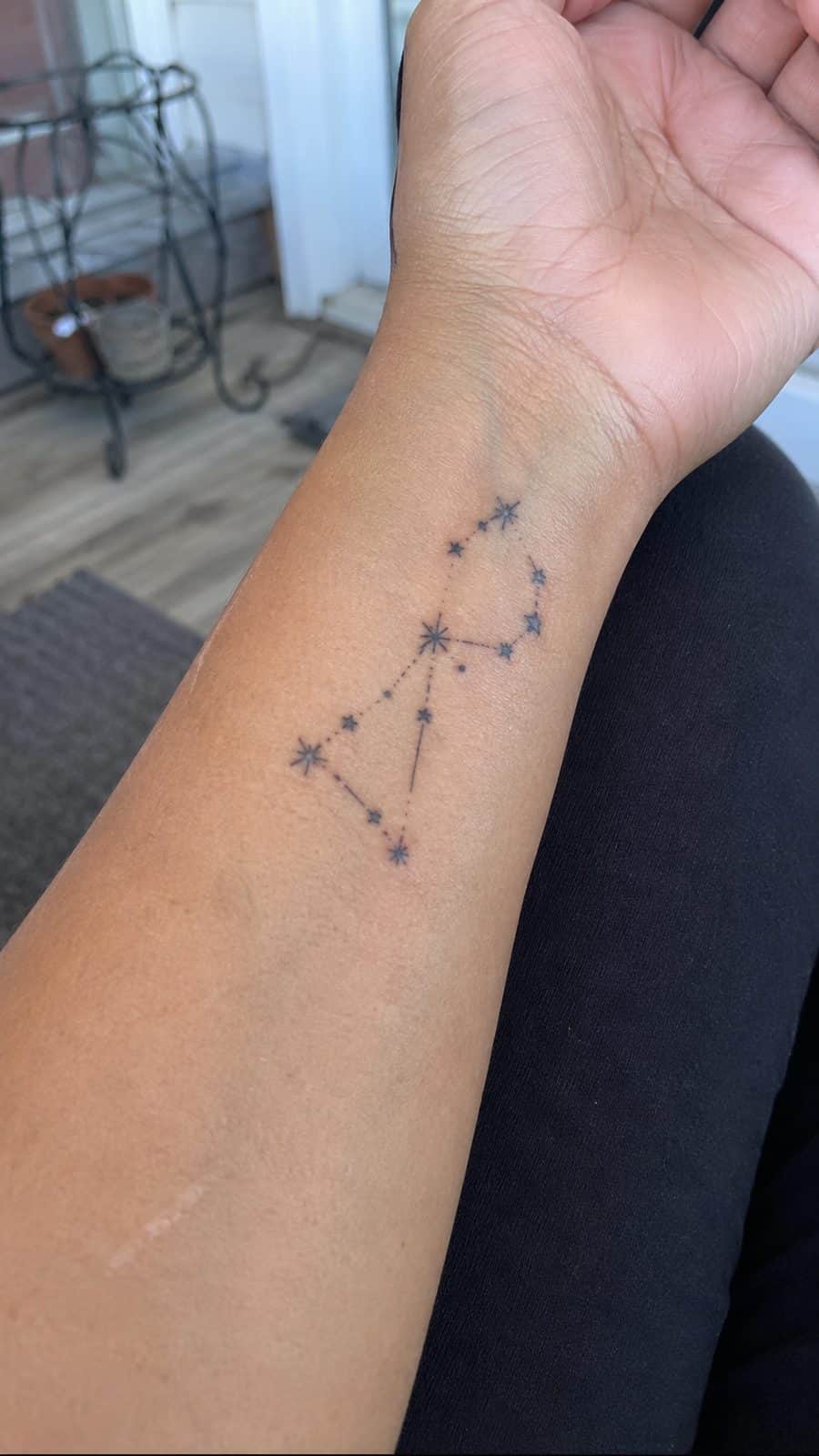 Wrist Tattoos Women Are Raving About: Discover the 28 Most Gorgeous Designs 18 Healed constellation of stars tattoo on a adult woman's inner wrist, photographed in a natural straight-on close view, a touch — study 2