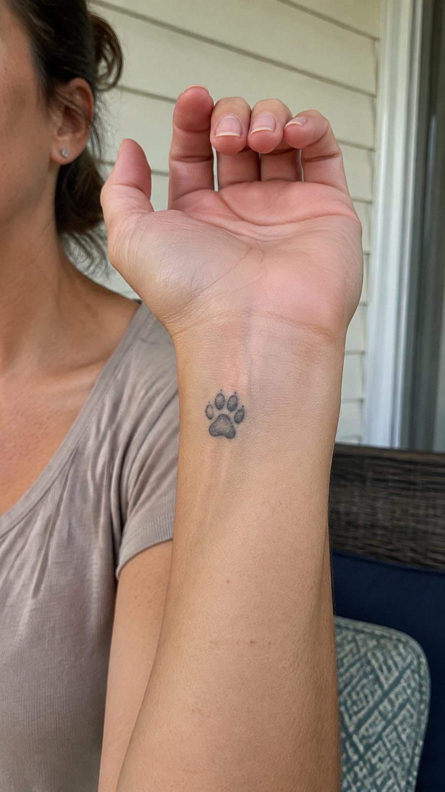 Wrist Tattoos Women Are Raving About: Discover the 28 Most Gorgeous Designs 24 Healed paw print tribute tattoo on a adult woman's inner wrist, photographed in a natural gentle side angle that clearly shows how the — study 1