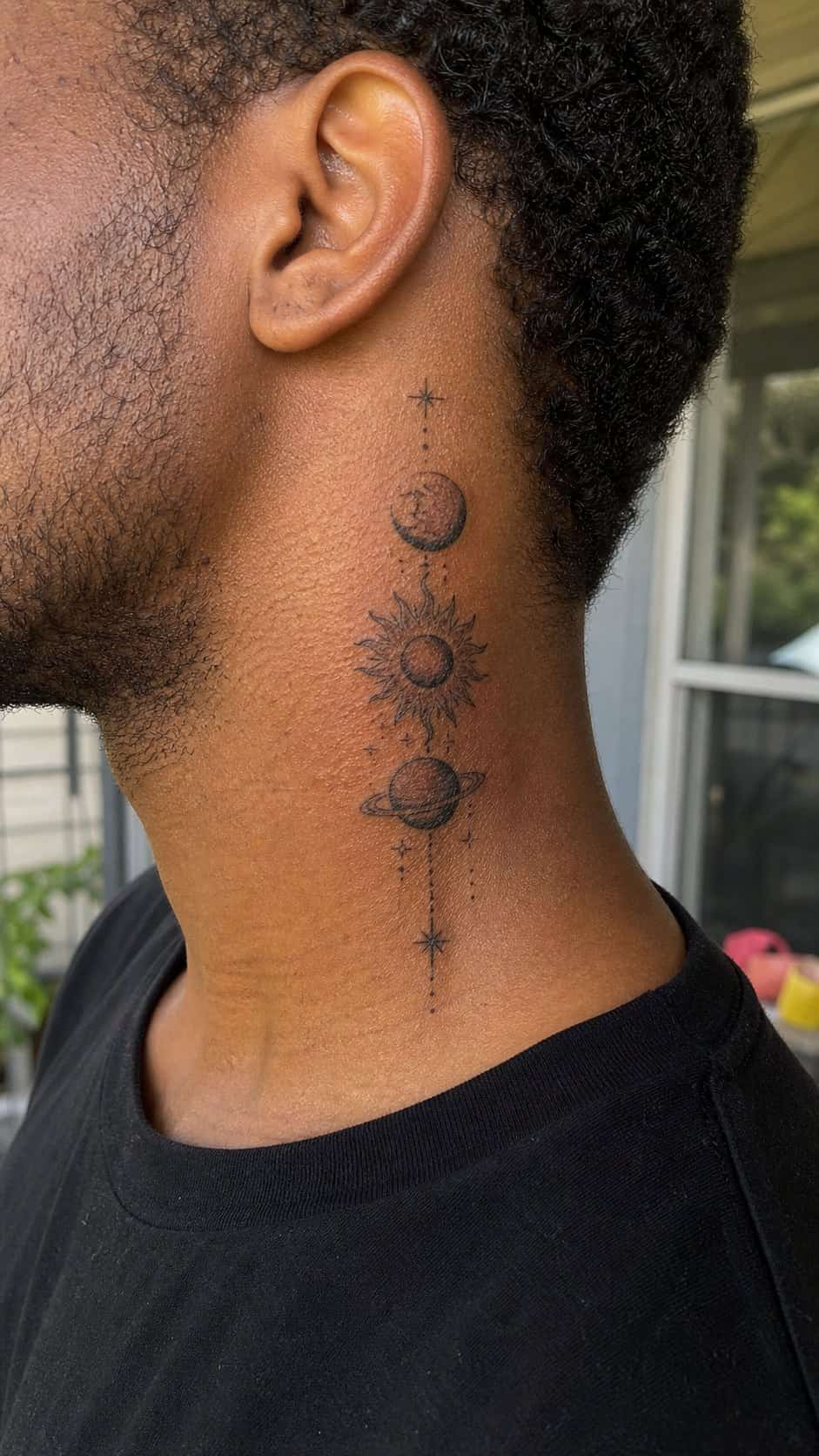 15 Neck Tattoo Ideas for Men Worth Considering 4 Healed celestial symbols tattoo on a adult man's side neck, photographed in a natural straight-on close view, a touch off-center like — study 1