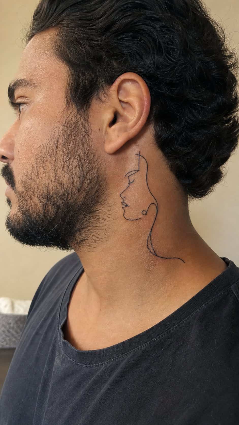15 Neck Tattoo Ideas for Men Worth Considering 16 Healed minimalist line art tattoo on a adult man's side neck, photographed in a natural casual close three-quarter view — study 1