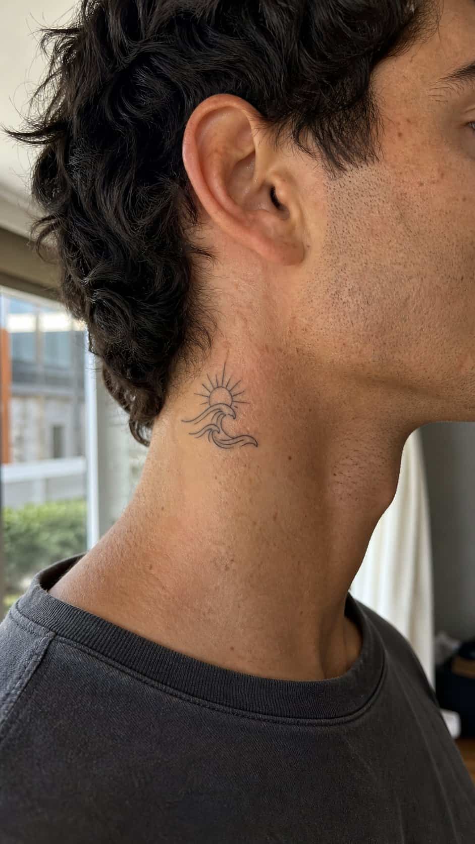 15 Neck Tattoo Ideas for Men Worth Considering 17 Healed minimalist line art tattoo on a adult man's side neck, photographed in a natural straight-on close view, a touch off-center — study 2