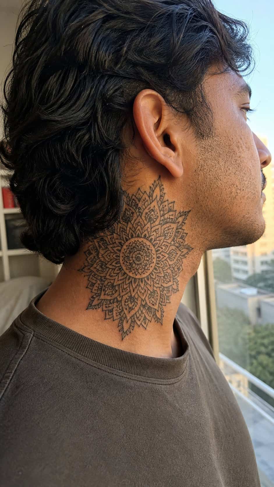 15 Neck Tattoo Ideas for Men Worth Considering 20 Healed intricate mandala tattoo on a adult man's side neck, photographed in a natural slightly elevated close view — study 3