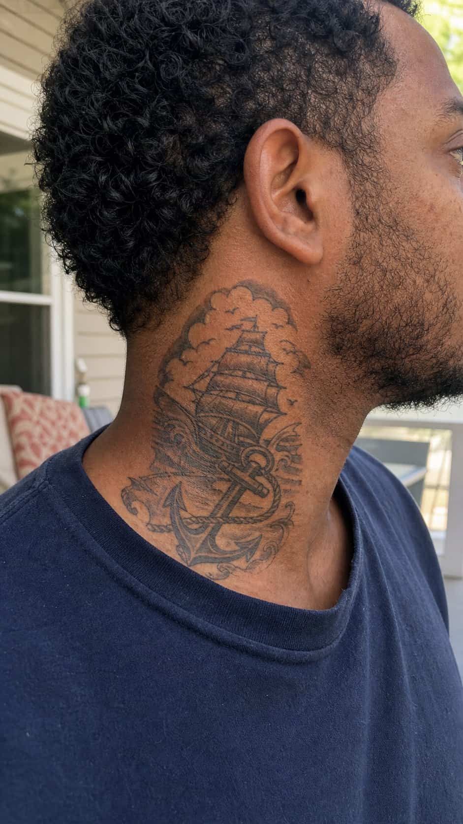 15 Neck Tattoo Ideas for Men Worth Considering 22 Healed retro nautical theme tattoo on a adult man's side neck, photographed in a natural relaxed documentary crop — study 2