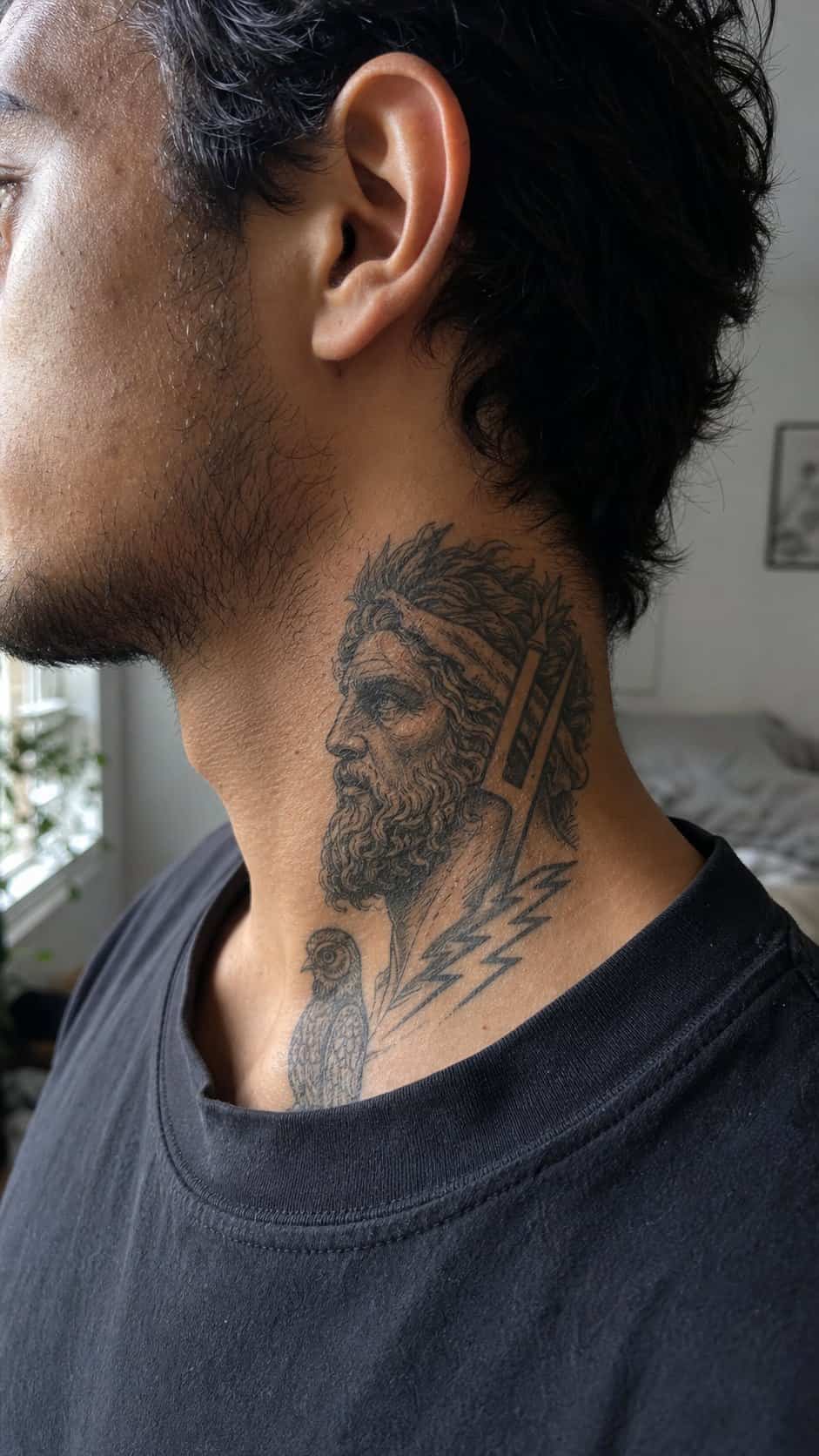 15 Neck Tattoo Ideas for Men Worth Considering 25 Healed ancient mythology tattoo on a adult man's side neck, photographed in a natural casual close three-quarter view — study 1